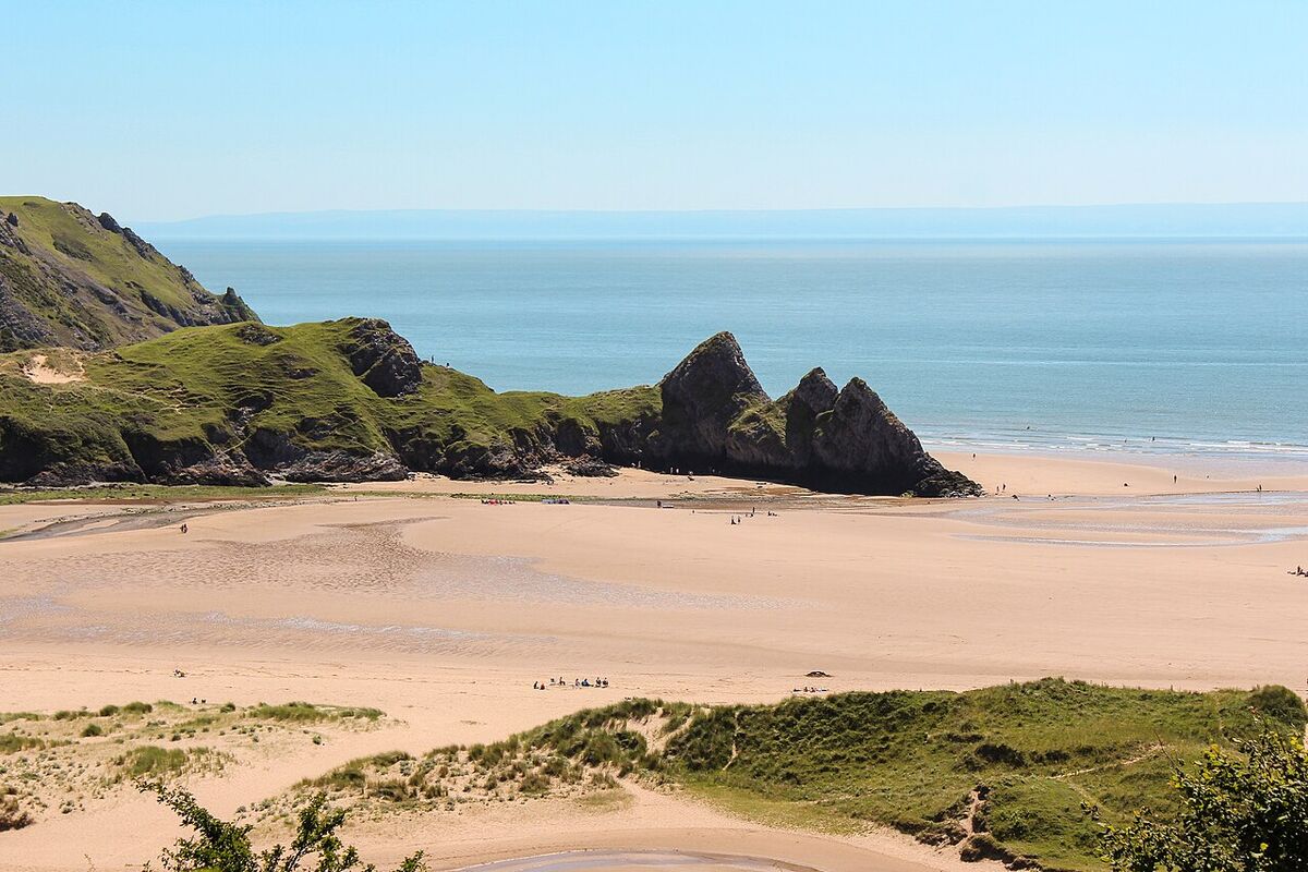 Three Cliffs Bay beach and rocky headlands in Wales